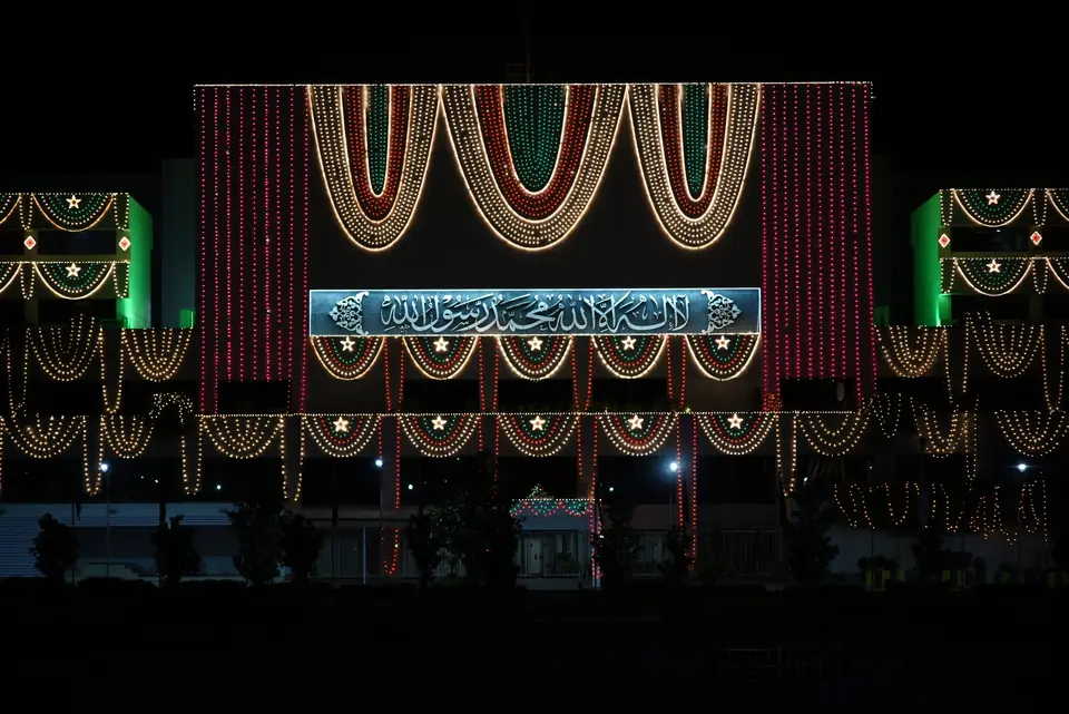 Parliament House in Islamabad, where the National Assembly sits, lit with strings of lights at night in November 2018