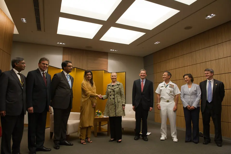 Secretary of State Hillary Clinton shakes hands with Pakistani Foreign Minister Hina Rabbani Khar at their bilateral meeting at the Tokyo Conference on Afghanistan, 8 July 2012
